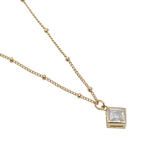 
            
                Load image into Gallery viewer, Gold Plated Clear Stone Square necklace with beaded chain
            
        