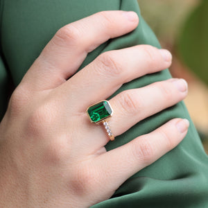 Statement Emerald Gold Ring Styled with a Green Blazer 