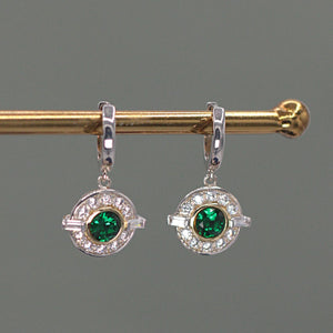 
            
                Load image into Gallery viewer, Rhodium Art Deco Style Round Cubic Zirconia Drop Earrings with a Emerald Centre Stone 
            
        