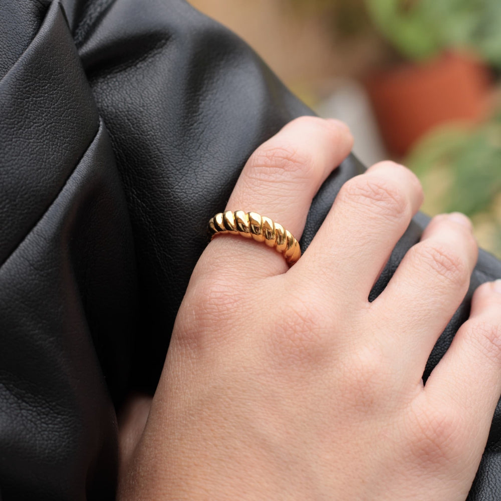 Gold Croissant Ring Styled with a Leather Jacket